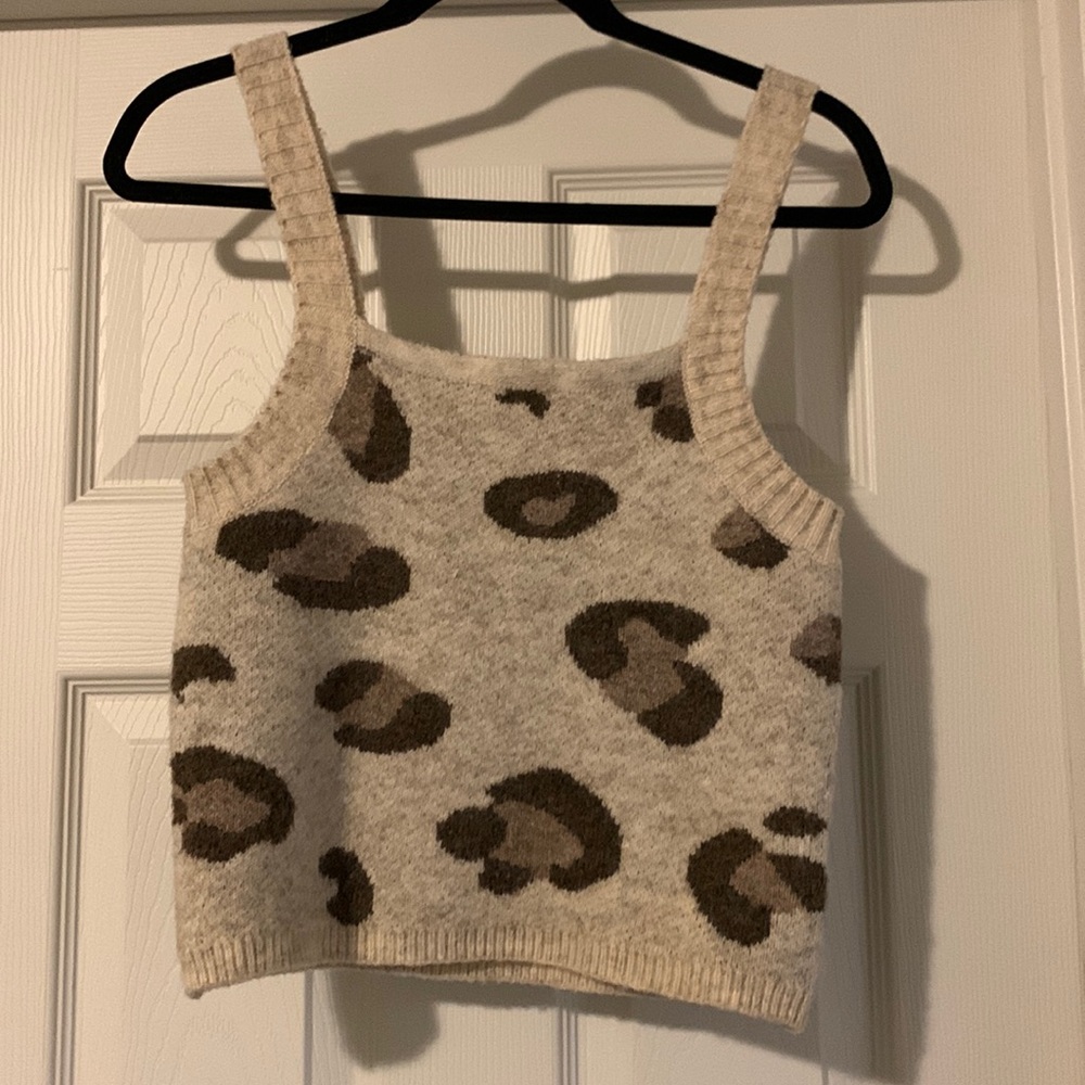 The willow tree. Tank top sweater, size small but fits slightly larger.